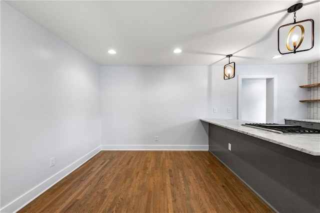 957 Sharon Cir SE, Smyrna, GA 30080 - unfurnished dining area featuring baseboards, recessed lighting, and dark wood-type flooring