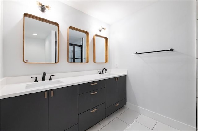 957 Sharon Cir SE, Smyrna, GA 30080 - full bathroom featuring double vanity, tile patterned floors, and baseboards