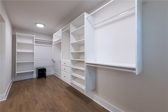 957 Sharon Cir SE, Smyrna, GA 30080 - walk in closet featuring dark wood-style floors