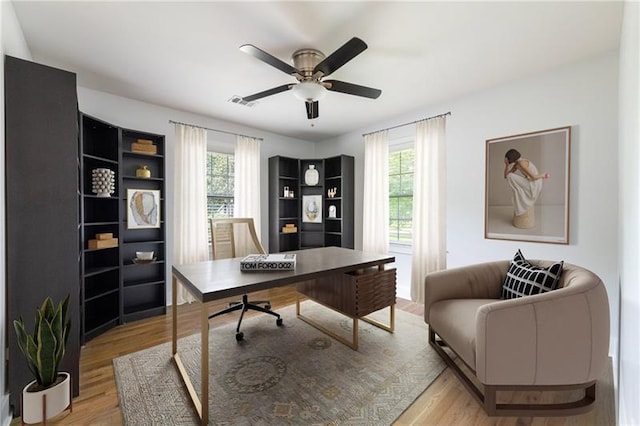 957 Sharon Cir SE, Smyrna, GA 30080 - office area featuring plenty of natural light, light wood-style flooring, and a ceiling fan