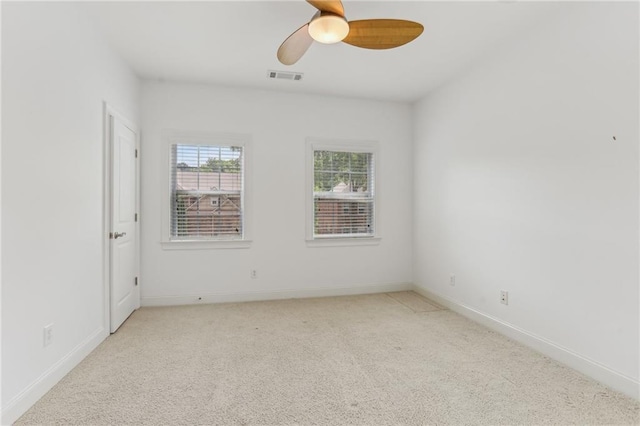 4540 Hastings Dr, Cumming, GA 30041 - unfurnished room with light colored carpet, baseboards, and ceiling fan