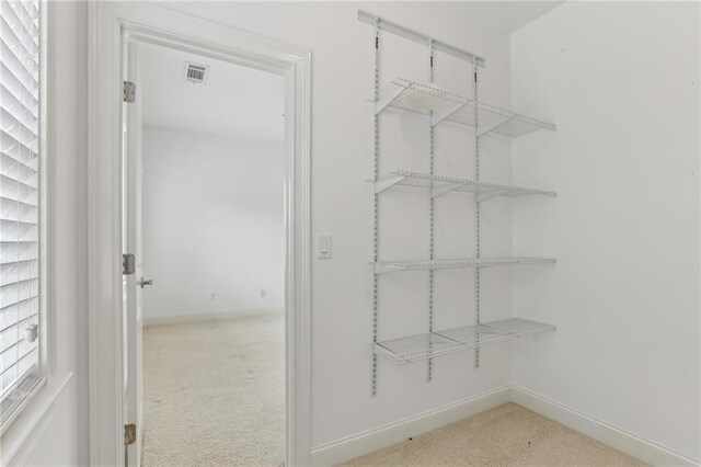 4540 Hastings Dr, Cumming, GA 30041 - walk in closet featuring light carpet