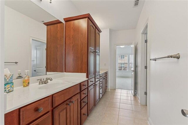 4540 Hastings Dr, Cumming, GA 30041 - bathroom featuring vanity, tile patterned floors, and baseboards