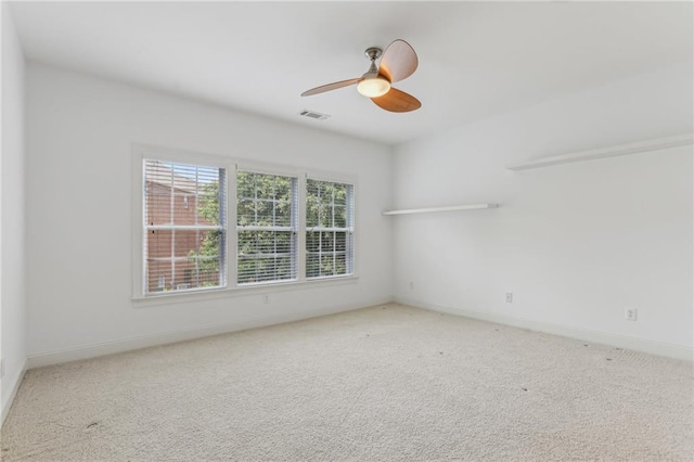 4540 Hastings Dr, Cumming, GA 30041 - empty room featuring carpet, a ceiling fan, and baseboards