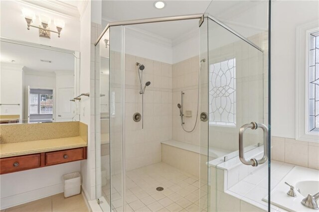 4540 Hastings Dr, Cumming, GA 30041 - bathroom featuring ornamental molding, a shower stall, vanity, a garden tub, and tile patterned flooring