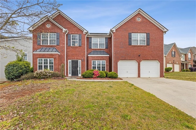 view of front of home featuring a garage and a front lawn