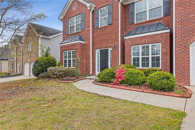 view of front of property with a front lawn