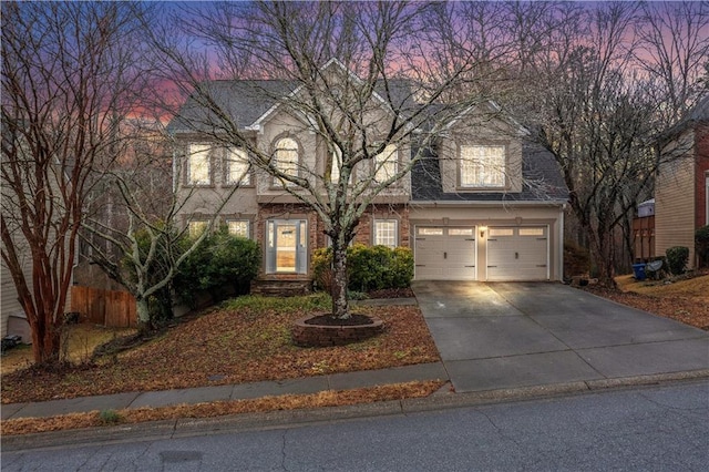 front of property featuring a garage