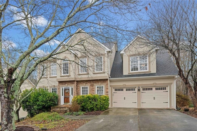 view of front of property with a garage