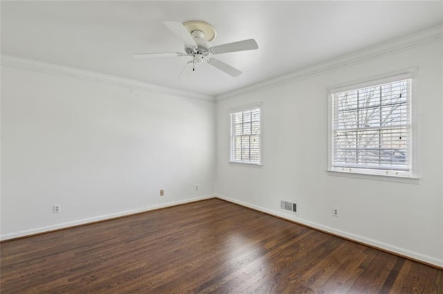 unfurnished room with dark hardwood / wood-style flooring, ornamental molding, and ceiling fan