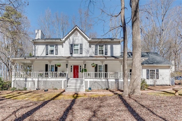 country-style home featuring a porch and a chimney