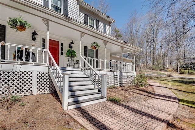 entrance to property with covered porch