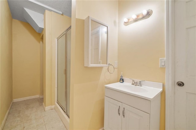 3436 Laurelwood Ct NE, Roswell, GA 30075 - bathroom with vanity, a shower stall, tile patterned floors, and a textured ceiling