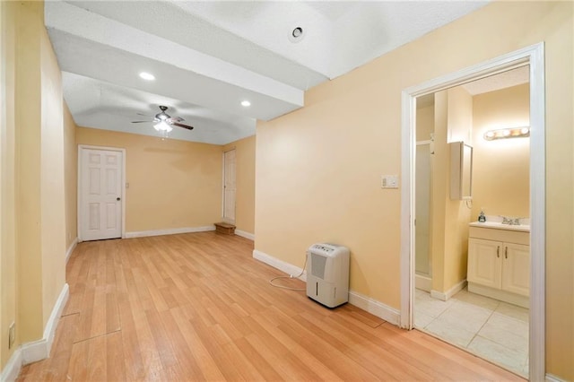 3436 Laurelwood Ct NE, Roswell, GA 30075 - spare room with a ceiling fan and light wood-style flooring