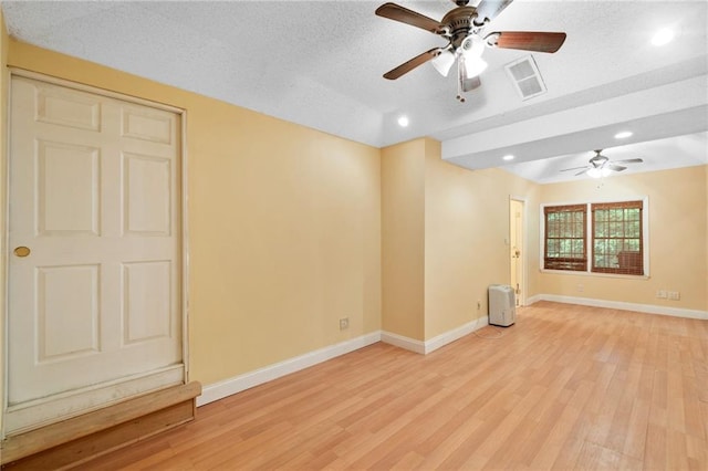 3436 Laurelwood Ct NE, Roswell, GA 30075 - spare room featuring ceiling fan, light wood-style floors, recessed lighting, and a textured ceiling