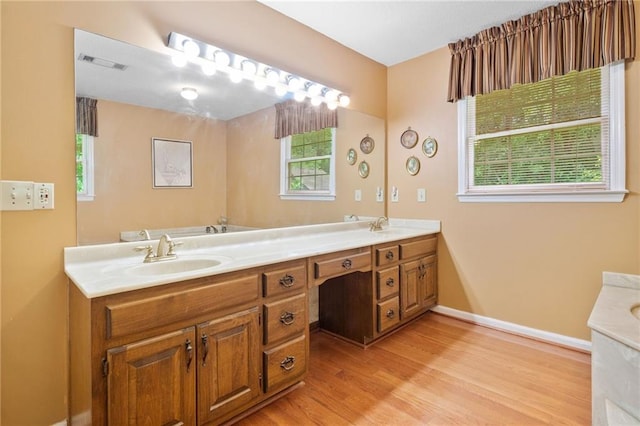 3436 Laurelwood Ct NE, Roswell, GA 30075 - full bathroom with double vanity and wood finished floors