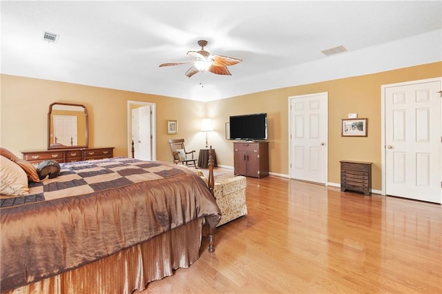 3436 Laurelwood Ct NE, Roswell, GA 30075 - bedroom featuring light wood-style flooring and ceiling fan
