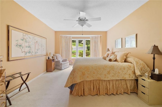 3436 Laurelwood Ct NE, Roswell, GA 30075 - bedroom featuring light carpet, a textured ceiling, and a ceiling fan