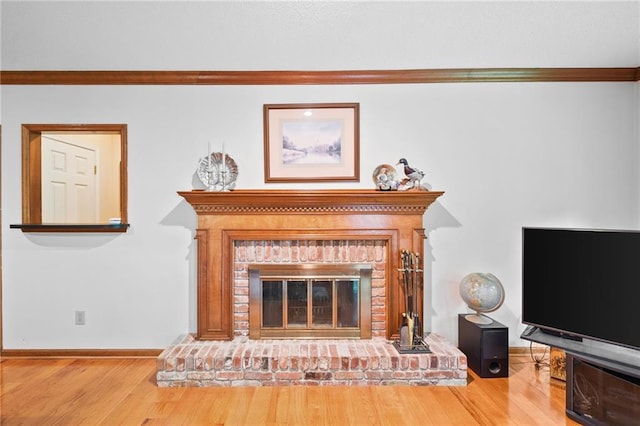 3436 Laurelwood Ct NE, Roswell, GA 30075 - detailed view of a fireplace, crown molding, and wood finished floors