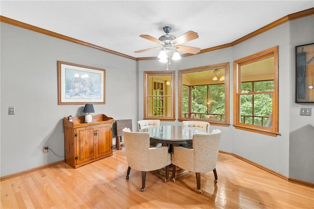 3436 Laurelwood Ct NE, Roswell, GA 30075 - dining area featuring light wood-style floors, ornamental molding, and a ceiling fan