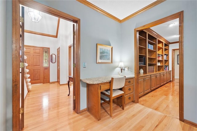 3436 Laurelwood Ct NE, Roswell, GA 30075 - office area with crown molding, light wood finished floors, and built in desk