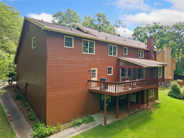 3436 Laurelwood Ct NE, Roswell, GA 30075 - rear view of property featuring a deck, a lawn, and a chimney