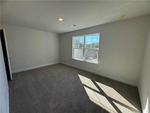 view of carpeted spare room