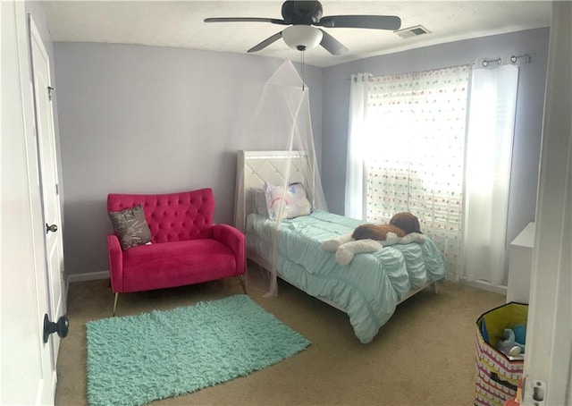 carpeted bedroom with ceiling fan