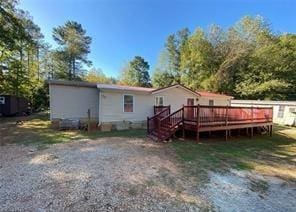 615 Woodruff Rd, Carrollton, GA 30116 - back of house with a deck