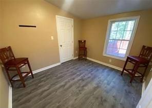 615 Woodruff Rd, Carrollton, GA 30116 - unfurnished room featuring vaulted ceiling, dark wood finished floors, and baseboards