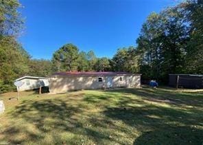 615 Woodruff Rd, Carrollton, GA 30116 - exterior space with a lawn