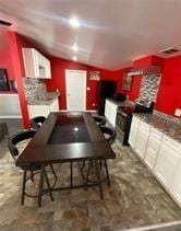 615 Woodruff Rd, Carrollton, GA 30116 - rec room with visible vents and vaulted ceiling