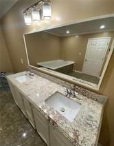 615 Woodruff Rd, Carrollton, GA 30116 - bathroom with double vanity and a sink