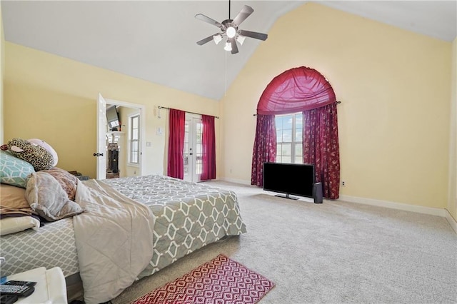 carpeted bedroom with high vaulted ceiling, access to exterior, baseboards, and ceiling fan