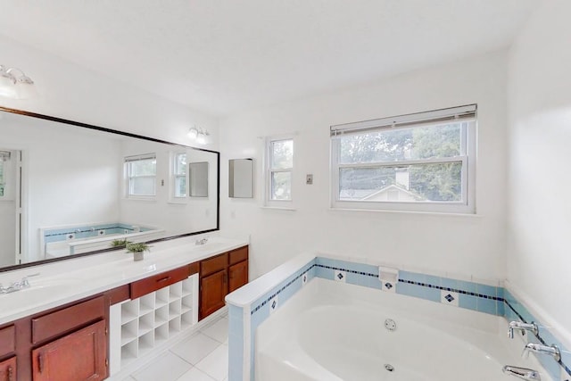 full bathroom featuring double vanity, a garden tub, a sink, and tile patterned floors