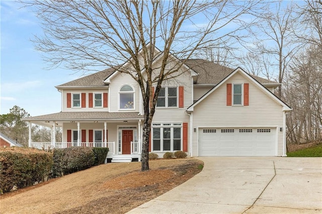 view of front facade featuring a garage, covered porch, roof with shingles, and driveway