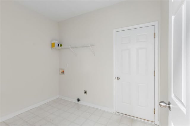 clothes washing area featuring hookup for a washing machine, hookup for an electric dryer, laundry area, baseboards, and light floors