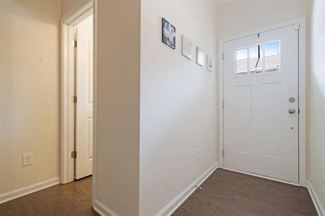 doorway to outside with dark hardwood / wood-style floors