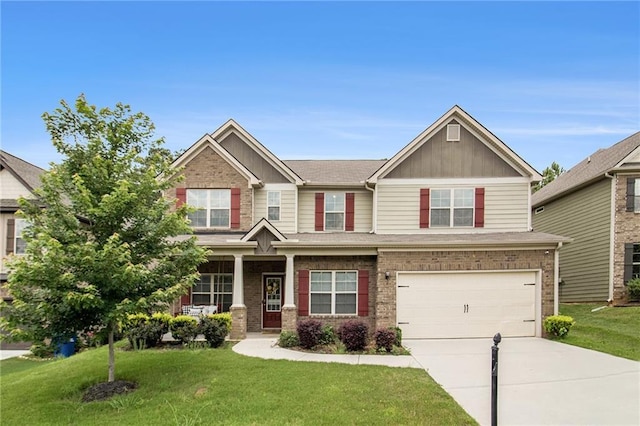 6213 Old Kingston Dr, Atlanta, GA 30331 - craftsman inspired home featuring brick siding, concrete driveway, a front yard, and board and batten siding