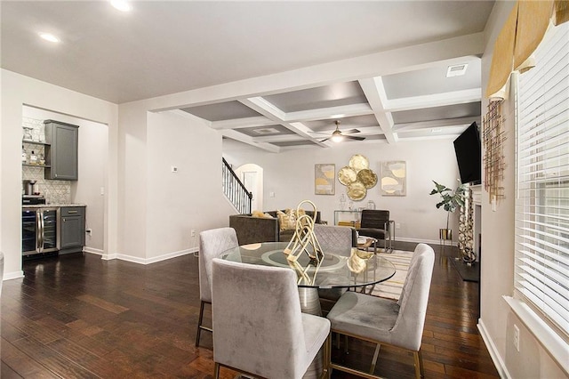 6213 Old Kingston Dr, Atlanta, GA 30331 - dining space featuring dark wood-style flooring, beamed ceiling, ceiling fan, beverage cooler, and coffered ceiling