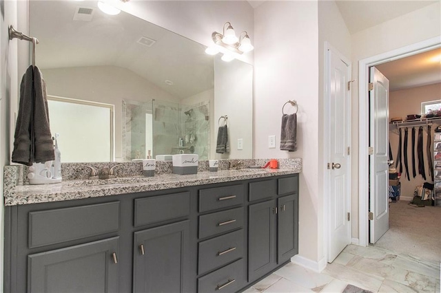 6213 Old Kingston Dr, Atlanta, GA 30331 - bathroom with a stall shower, double vanity, vaulted ceiling, and a spacious closet