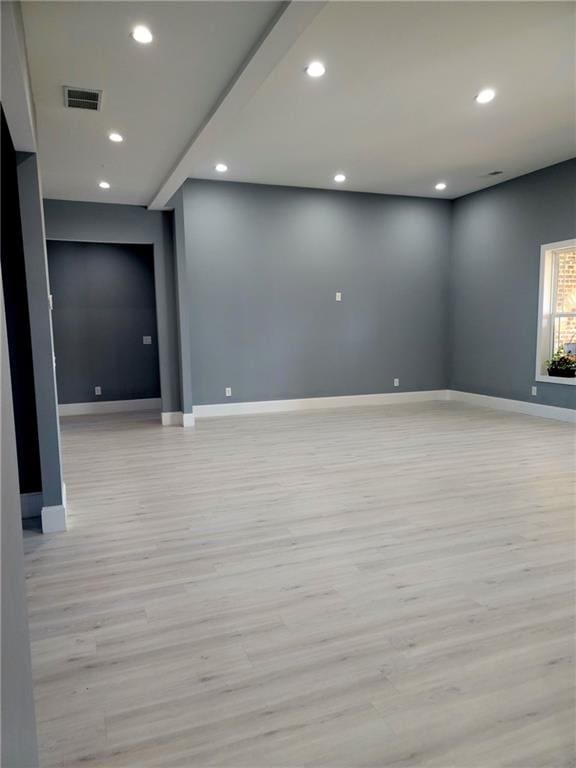 unfurnished room featuring light hardwood / wood-style flooring