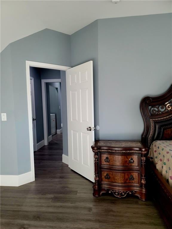 bedroom featuring dark hardwood / wood-style floors