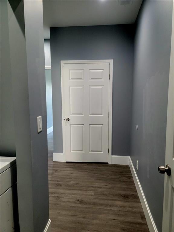 interior space with hardwood / wood-style flooring and vanity