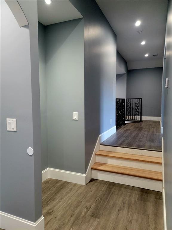 hallway featuring wood-type flooring