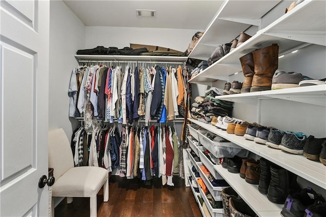 walk in closet featuring visible vents and wood finished floors