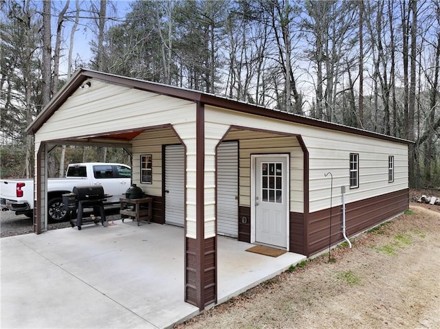 view of outbuilding featuring driveway