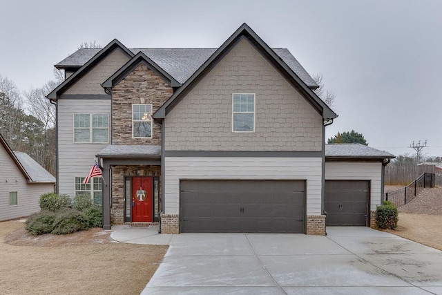 craftsman house with a garage