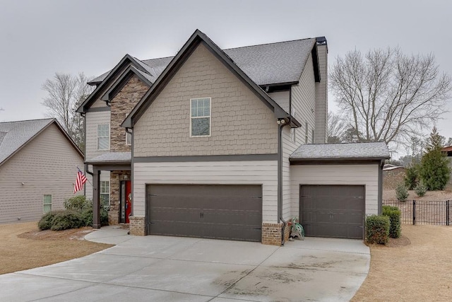 craftsman house with a garage