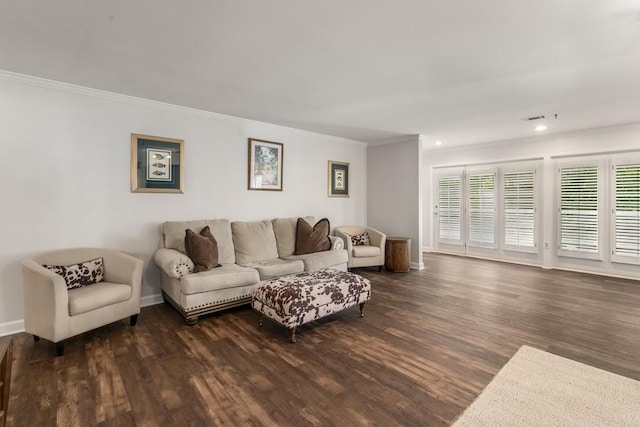 living room with dark hardwood / wood-style floors and ornamental molding